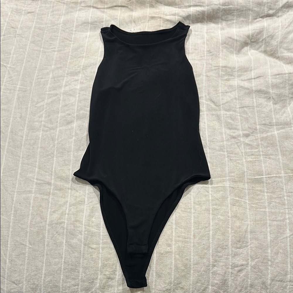 Black high next body suit